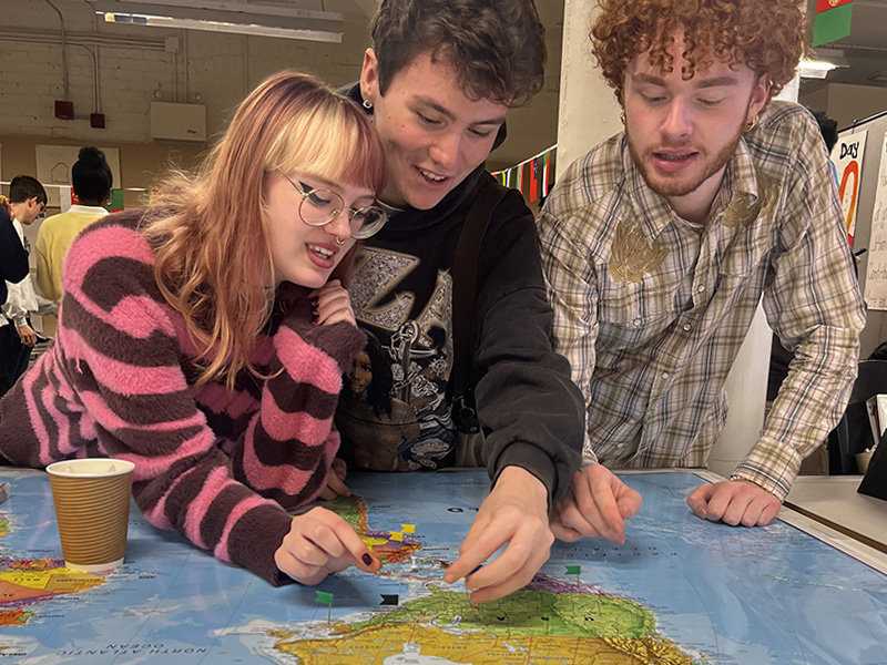 A couple places flags on a map